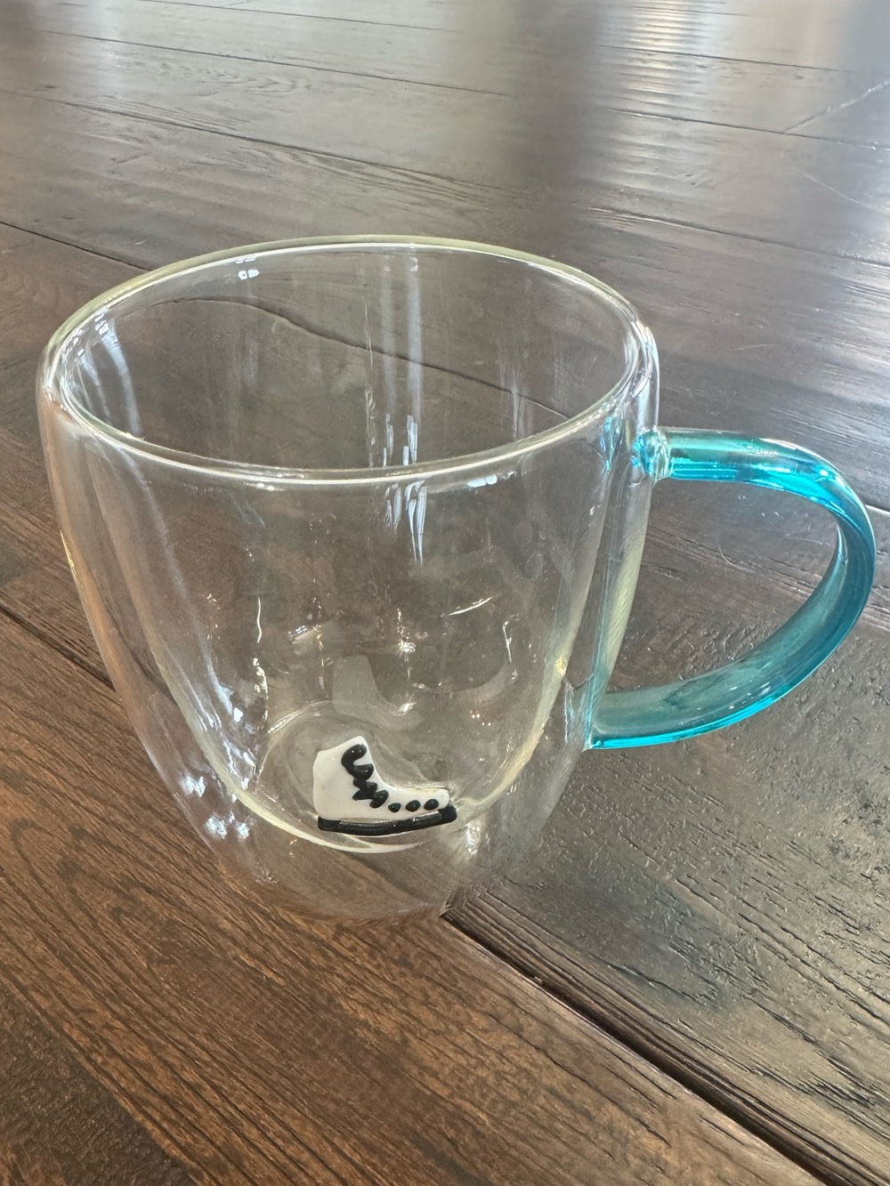 Anthropologie Icon Holiday Glass Juice Mug with Blue Handle and Mini Ice-skate